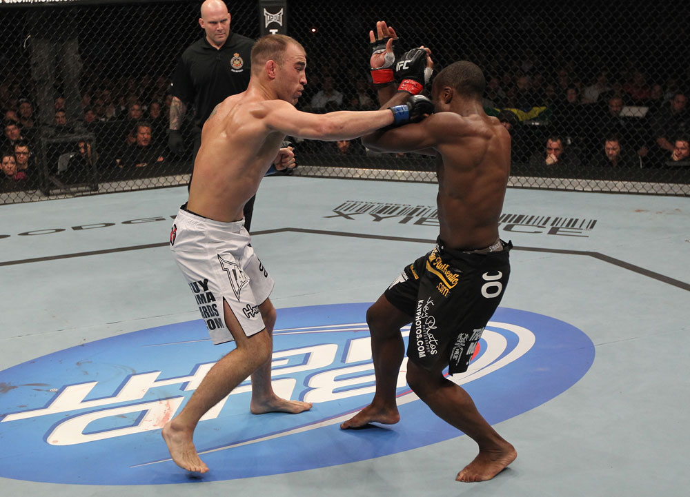 TORONTO, ON - DECEMBER 10:  Brian Ebersole (white shorts) punches Claude Patrick during the UFC 140 event at Air Canada Centre on December 10, 2011 in Toronto, Ontario, Canada.  (Photo by Nick Laham/Zuffa LLC/Zuffa LLC via Getty Images)