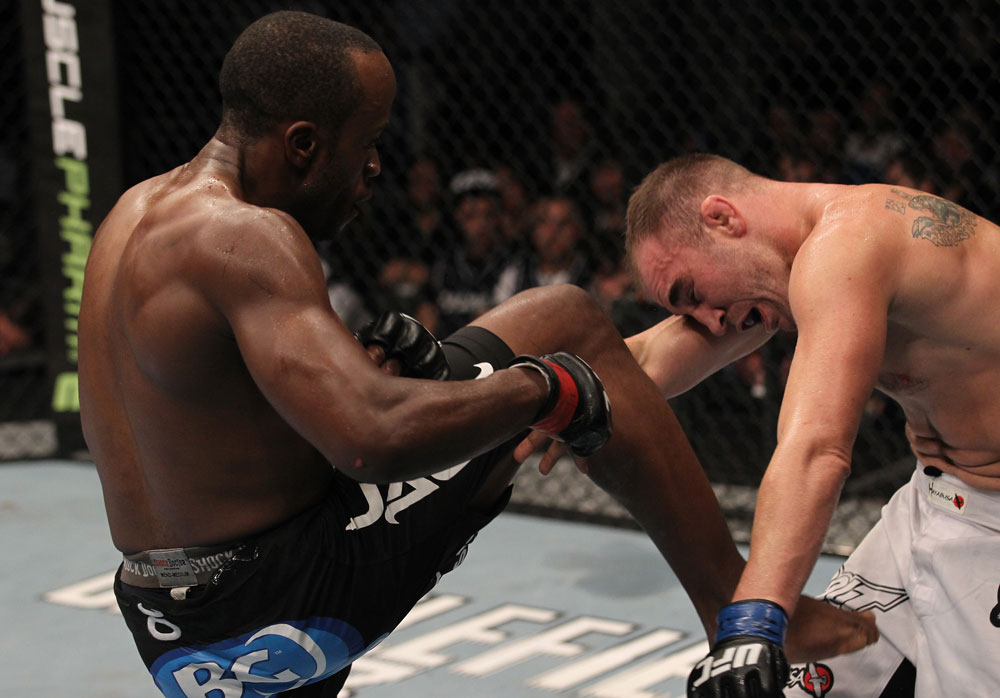 TORONTO, ON - DECEMBER 10:  (L-R) Claude Patrick delivers a knee strike against Brian Ebersole during the UFC 140 event at Air Canada Centre on December 10, 2011 in Toronto, Ontario, Canada.  (Photo by Nick Laham/Zuffa LLC/Zuffa LLC via Getty Images)