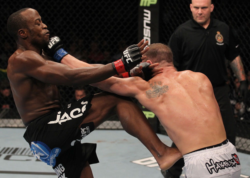 TORONTO, ON - DECEMBER 10:  Brian Ebersole (white shorts) punches Claude Patrick during the UFC 140 event at Air Canada Centre on December 10, 2011 in Toronto, Ontario, Canada.  (Photo by Nick Laham/Zuffa LLC/Zuffa LLC via Getty Images)