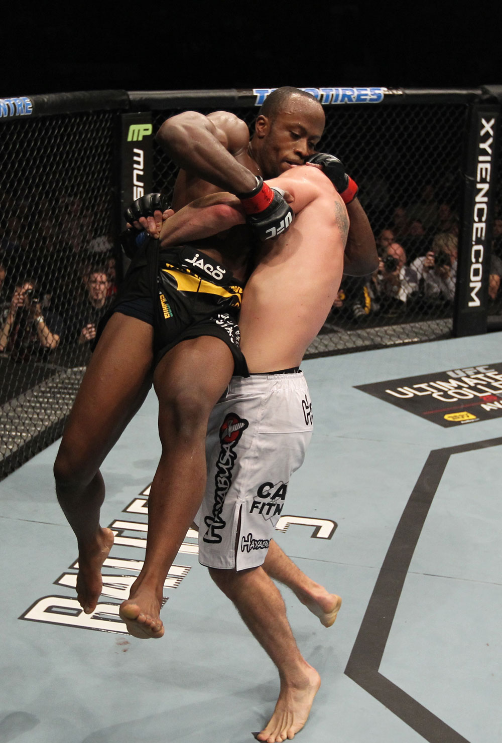 TORONTO, ON - DECEMBER 10:  (R-L) Brian Ebersole prepares to slam Claude Patrick to the mat during the UFC 140 event at Air Canada Centre on December 10, 2011 in Toronto, Ontario, Canada.  (Photo by Nick Laham/Zuffa LLC/Zuffa LLC via Getty Images)