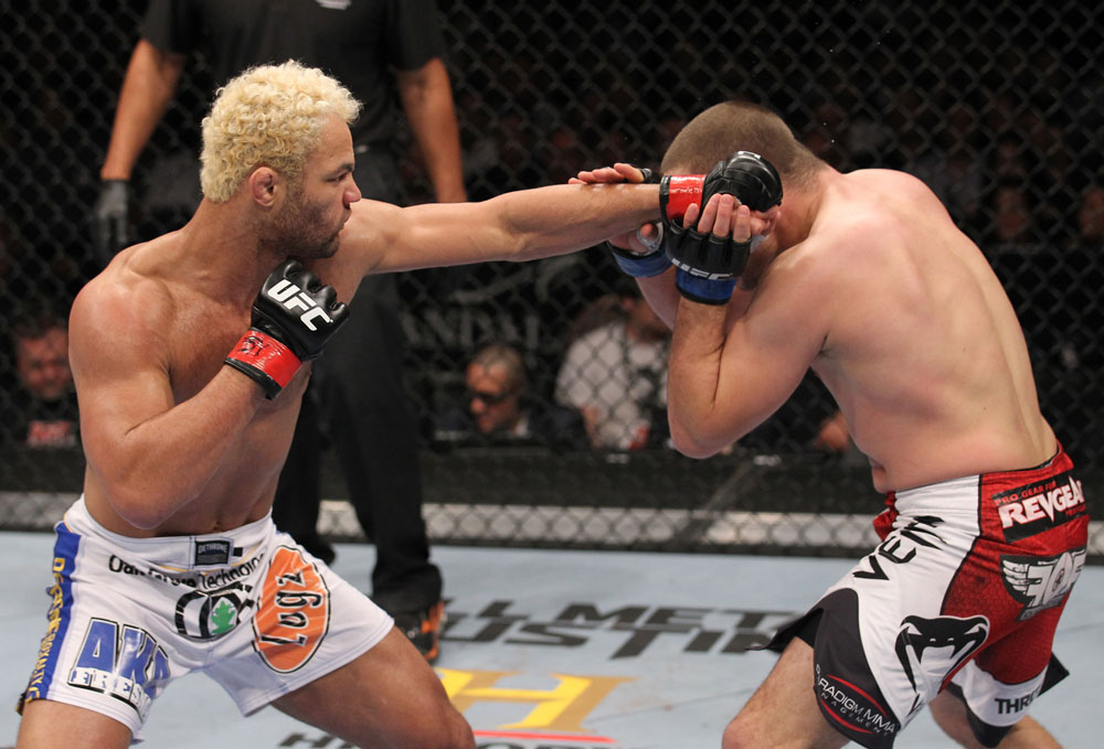 LAS VEGAS, NV - FEBRUARY 04:  Josh Koscheck (left) punches Mike Pierce during the UFC 143 event at Mandalay Bay Events Center on February 4, 2012 in Las Vegas, Nevada.  (Photo by Nick Laham/Zuffa LLC/Zuffa LLC via Getty Images) *** Local Caption *** Josh Koscheck; Mike Pierce