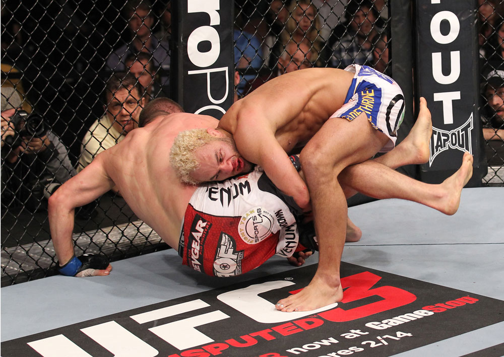 LAS VEGAS, NV - FEBRUARY 04:  Josh Koscheck (right) wrestles Mike Pierce to the ground during the UFC 143 event at Mandalay Bay Events Center on February 4, 2012 in Las Vegas, Nevada.  (Photo by Nick Laham/Zuffa LLC/Zuffa LLC via Getty Images) *** Local Caption *** Josh Koscheck