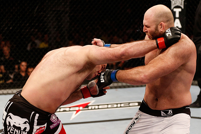 SAO PAULO, BRAZIL - JANUARY 19: (L-R) Gabriel Gonzaga punches Ben Rothwell in their heavyweight fight at the UFC on FX event on January 19, 2013 at Ibirapuera Gymnasium in Sao Paulo, Brazil. (Photo by Josh Hedges/Zuffa LLC/Zuffa LLC via Getty Images)
