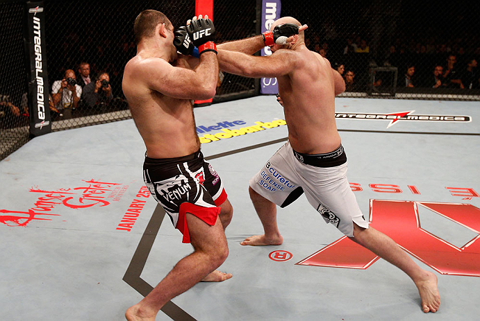 SAO PAULO, BRAZIL - JANUARY 19: (R-L) Ben Rothwell punches Gabriel Gonzaga in their heavyweight fight at the UFC on FX event on January 19, 2013 at Ibirapuera Gymnasium in Sao Paulo, Brazil. (Photo by Josh Hedges/Zuffa LLC/Zuffa LLC via Getty Images)