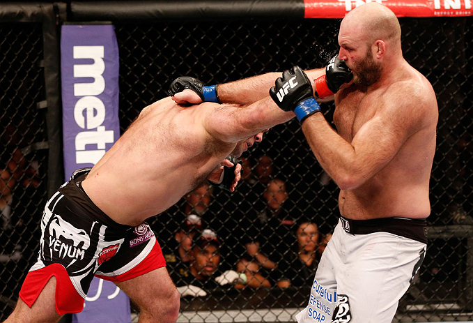 SAO PAULO, BRAZIL - JANUARY 19: (L-R) Gabriel Gonzaga punches Ben Rothwell in their heavyweight fight at the UFC on FX event on January 19, 2013 at Ibirapuera Gymnasium in Sao Paulo, Brazil. (Photo by Josh Hedges/Zuffa LLC/Zuffa LLC via Getty Images)