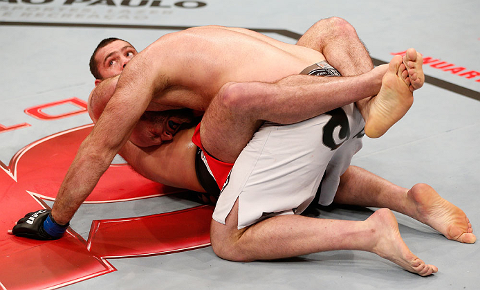 SAO PAULO, BRAZIL - JANUARY 19: (L-R) Gabriel Gonzaga secures a guillotine choke submission against Ben Rothwell in their heavyweight fight at the UFC on FX event on January 19, 2013 at Ibirapuera Gymnasium in Sao Paulo, Brazil. (Photo by Josh Hedges/Zuffa LLC/Zuffa LLC via Getty Images)