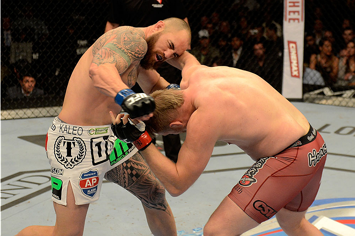 LAS VEGAS, NV - DECEMBER 28:  (L-R) Travis Browne punches Josh Barnett in their heavyweight bout during the UFC 168 event at the MGM Grand Garden Arena on December 28, 2013 in Las Vegas, Nevada. (Photo by Donald Miralle/Zuffa LLC/Zuffa LLC via Getty Images) *** Local Caption *** Josh Barnett; Travis Browne