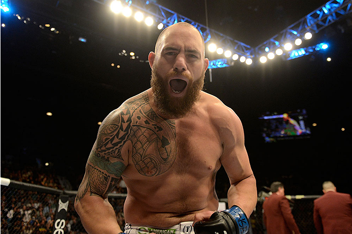 LAS VEGAS, NV - DECEMBER 28:  Travis Browne reacts to his victory over Josh Barnett in their heavyweight bout during the UFC 168 event at the MGM Grand Garden Arena on December 28, 2013 in Las Vegas, Nevada. (Photo by Donald Miralle/Zuffa LLC/Zuffa LLC via Getty Images) *** Local Caption *** Travis Browne