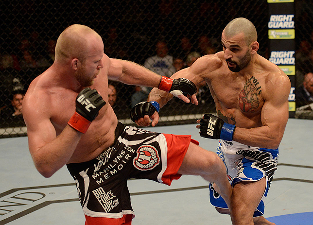 LAS VEGAS, NV - DECEMBER 29:  (L-R) Tim Boetsch kicks Constantinos Philippou during their middleweight fight at UFC 155 on December 29, 2012 at MGM Grand Garden Arena in Las Vegas, Nevada. (Photo by Donald Miralle/Zuffa LLC/Zuffa LLC via Getty Images) *** Local Caption *** Tim Boetsch; Constantinos Philippou