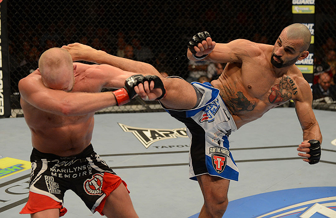 LAS VEGAS, NV - DECEMBER 29:  (R-L) Constantinos Philippou kicks Tim Boetsch during their middleweight fight at UFC 155 on December 29, 2012 at MGM Grand Garden Arena in Las Vegas, Nevada. (Photo by Donald Miralle/Zuffa LLC/Zuffa LLC via Getty Images) *** Local Caption *** Tim Boetsch; Constantinos Philippou