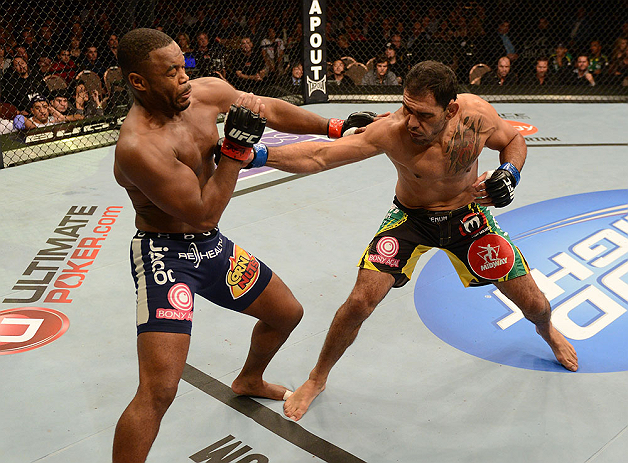 LAS VEGAS, NV - FEBRUARY 02: Antonio Rogerio Nogueira (right) punches Rashad Evans during their light heavyweight fight at UFC 156 on February 2, 2013 at the Mandalay Bay Events Center in Las Vegas, Nevada. (Photo by Donald Miralle/Zuffa LLC/Zuffa LLC via Getty Images) *** Local Caption *** Rashad Evans; Antonio Rogerio Nogueira