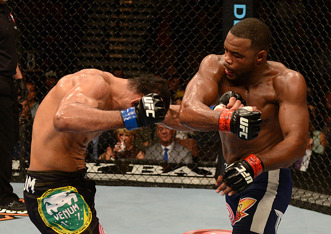 LAS VEGAS, NV - FEBRUARY 02: (R-L) Rashad Evans punches Antonio Rogerio Nogueira during their light heavyweight fight at UFC 156 on February 2, 2013 at the Mandalay Bay Events Center in Las Vegas, Nevada. (Photo by Donald Miralle/Zuffa LLC/Zuffa LLC via Getty Images) *** Local Caption *** Rashad Evans; Antonio Rogerio Nogueira