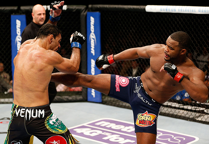 LAS VEGAS, NV - FEBRUARY 02: (R-L) Rashad Evans kicks Antonio Rogerio Nogueira during their light heavyweight fight at UFC 156 on February 2, 2013 at the Mandalay Bay Events Center in Las Vegas, Nevada. (Photo by Josh Hedges/Zuffa LLC/Zuffa LLC via Getty Images) *** Local Caption *** Rashad Evans; Antonio Rogerio Nogueira