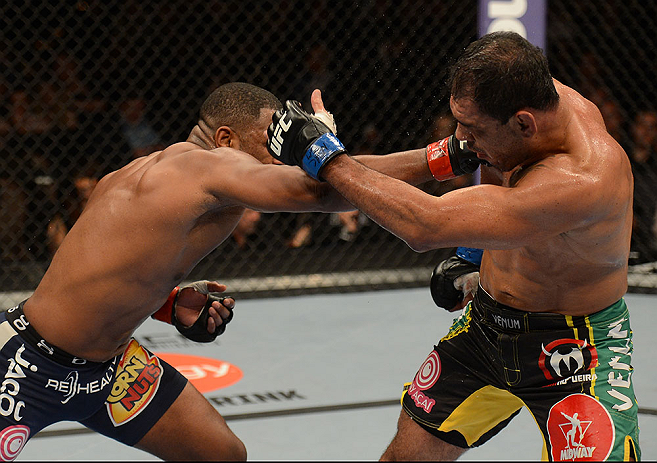 LAS VEGAS, NV - FEBRUARY 02: (L-R) Rashad Evans punches Antonio Rogerio Nogueira during their light heavyweight fight at UFC 156 on February 2, 2013 at the Mandalay Bay Events Center in Las Vegas, Nevada. (Photo by Donald Miralle/Zuffa LLC/Zuffa LLC via Getty Images) *** Local Caption *** Rashad Evans; Antonio Rogerio Nogueira