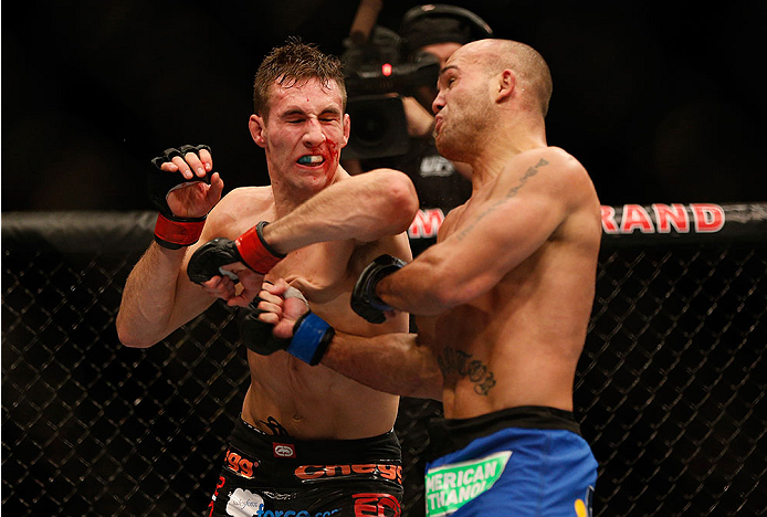 LAS VEGAS, NV - NOVEMBER 16:  (L-R) Rory MacDonald elbows Robbie Lawler in their welterweight bout during the UFC 167 event inside the MGM Grand Garden Arena on November 16, 2013 in Las Vegas, Nevada. (Photo by Josh Hedges/Zuffa LLC/Zuffa LLC via Getty Images) *** Local Caption *** Rory MacDonald; Robbie Lawler