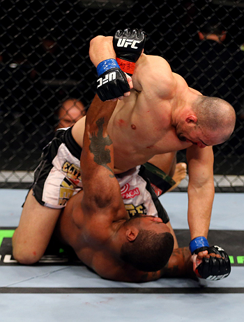 CHICAGO, IL - JANUARY 26:  Glover Teixeira (Top) fights Rampage Jackson (Bottom) during their Light Heavyweight Bout part of UFC on FOX at United Center on January 26, 2013 in Chicago, Illinois.  (Photo by Al Bello/Zuffa LLC/Zuffa LLC Via Getty Images)
