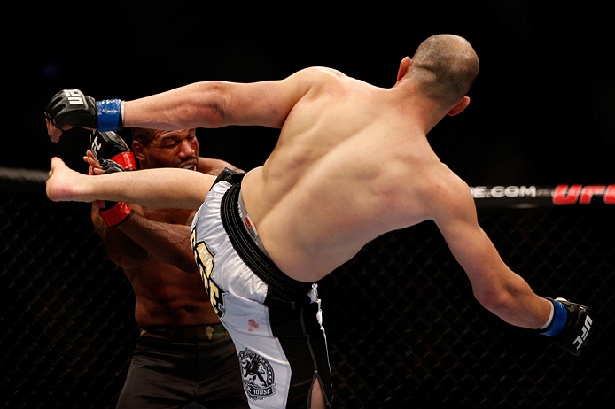 CHICAGO, IL - JANUARY 26:  Glover Teixeira (R) kicks Rampage Jackson (L) during their Light Heavyweight Bout part of UFC on FOX at United Center on January 26, 2013 in Chicago, Illinois.  (Photo by Josh Hedges/Zuffa LLC/Zuffa LLC Via Getty Images)