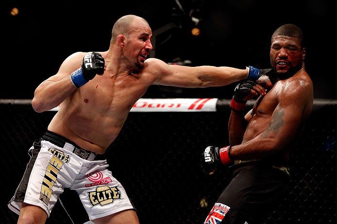 CHICAGO, IL - JANUARY 26:  Glover Teixeira (L) punches Rampage Jackson (R) during their Light Heavyweight Bout part of UFC on FOX at United Center on January 26, 2013 in Chicago, Illinois.  (Photo by Josh Hedges/Zuffa LLC/Zuffa LLC Via Getty Images)