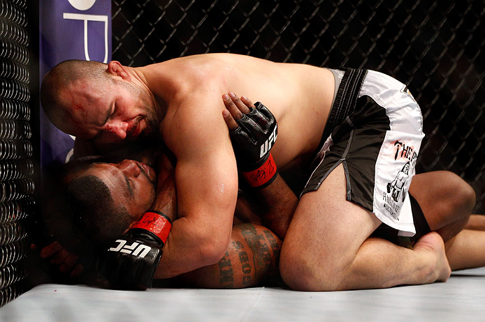 CHICAGO, IL - JANUARY 26:  Glover Teixeira (Top) fights Rampage Jackson (Bottom) during their Light Heavyweight Bout part of UFC on FOX at United Center on January 26, 2013 in Chicago, Illinois.  (Photo by Josh Hedges/Zuffa LLC/Zuffa LLC Via Getty Images)