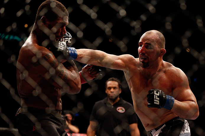 CHICAGO, IL - JANUARY 26:  Glover Teixeira (R) punches Rampage Jackson (L) during their Light Heavyweight Bout part of UFC on FOX at United Center on January 26, 2013 in Chicago, Illinois.  (Photo by Josh Hedges/Zuffa LLC/Zuffa LLC Via Getty Images)