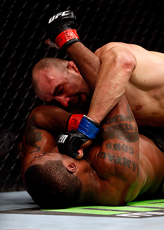 CHICAGO, IL - JANUARY 26:  Glover Teixeira (Top) fights Rampage Jackson (Bottom) during their Light Heavyweight Bout part of UFC on FOX at United Center on January 26, 2013 in Chicago, Illinois.  (Photo by Josh Hedges/Zuffa LLC/Zuffa LLC Via Getty Images)