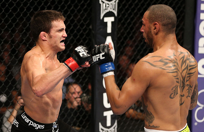 MINNEAPOLIS, MN - OCTOBER 05: (L-R) Jake Ellenberger fires a punch at Jay Hieron during their welterweight fight at the UFC on FX event at Target Center on October 5, 2012 in Minneapolis, Minnesota. (Photo by Josh Hedges/Zuffa LLC/Zuffa LLC via Getty Images)