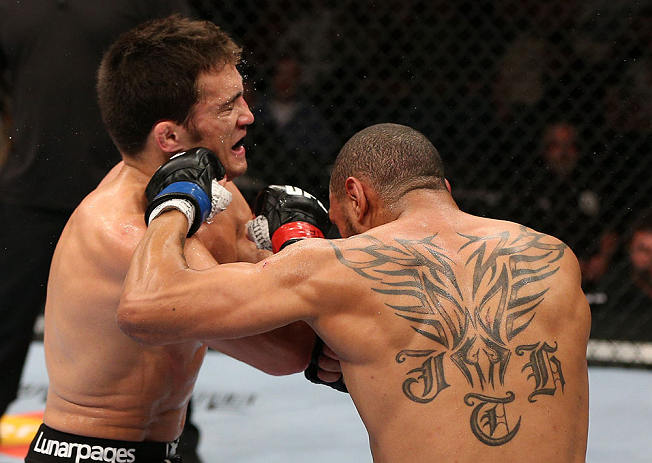 MINNEAPOLIS, MN - OCTOBER 05: (R-L) Jay Hieron and Jake Ellenberger trade punches during their welterweight fight at the UFC on FX event at Target Center on October 5, 2012 in Minneapolis, Minnesota. (Photo by Josh Hedges/Zuffa LLC/Zuffa LLC via Getty Images)