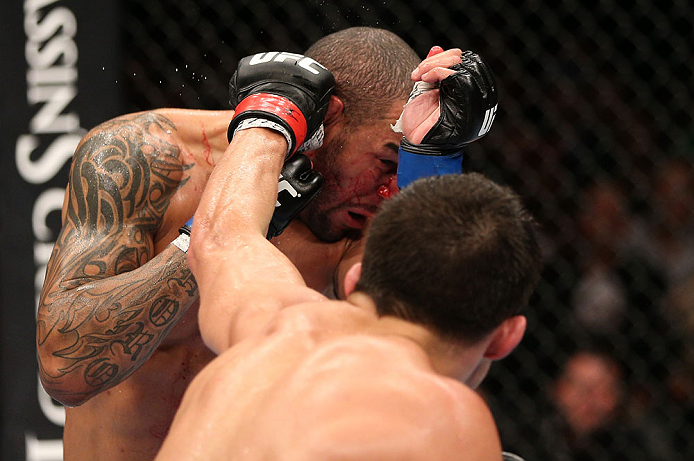 MINNEAPOLIS, MN - OCTOBER 05: (R-L) Jake Ellenberger punches Jay Hieron during their welterweight fight at the UFC on FX event at Target Center on October 5, 2012 in Minneapolis, Minnesota. (Photo by Josh Hedges/Zuffa LLC/Zuffa LLC via Getty Images)