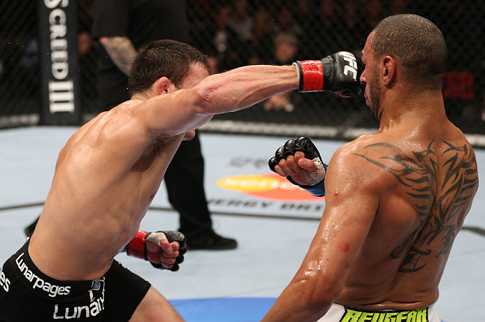MINNEAPOLIS, MN - OCTOBER 05: (L-R) Jake Ellenberger punches Jay Hieron during their welterweight fight at the UFC on FX event at Target Center on October 5, 2012 in Minneapolis, Minnesota. (Photo by Josh Hedges/Zuffa LLC/Zuffa LLC via Getty Images)