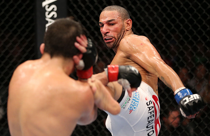 MINNEAPOLIS, MN - OCTOBER 05: (R-L) Jay Hieron kicks Jake Ellenberger during their welterweight fight at the UFC on FX event at Target Center on October 5, 2012 in Minneapolis, Minnesota. (Photo by Josh Hedges/Zuffa LLC/Zuffa LLC via Getty Images)