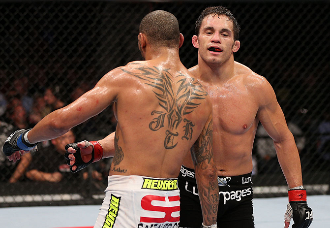MINNEAPOLIS, MN - OCTOBER 05: (R-L) Jake Ellenberger and Jay Hieron hug after their welterweight fight at the UFC on FX event at Target Center on October 5, 2012 in Minneapolis, Minnesota. (Photo by Josh Hedges/Zuffa LLC/Zuffa LLC via Getty Images)