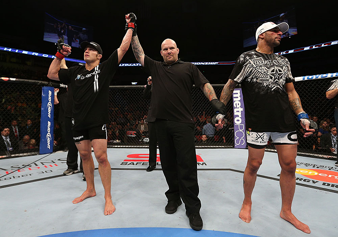 MINNEAPOLIS, MN - OCTOBER 05: Jake Ellenberger (L) reacts after defeating Jay Hieron (R) during their welterweight fight at the UFC on FX event at Target Center on October 5, 2012 in Minneapolis, Minnesota. (Photo by Josh Hedges/Zuffa LLC/Zuffa LLC via Getty Images)