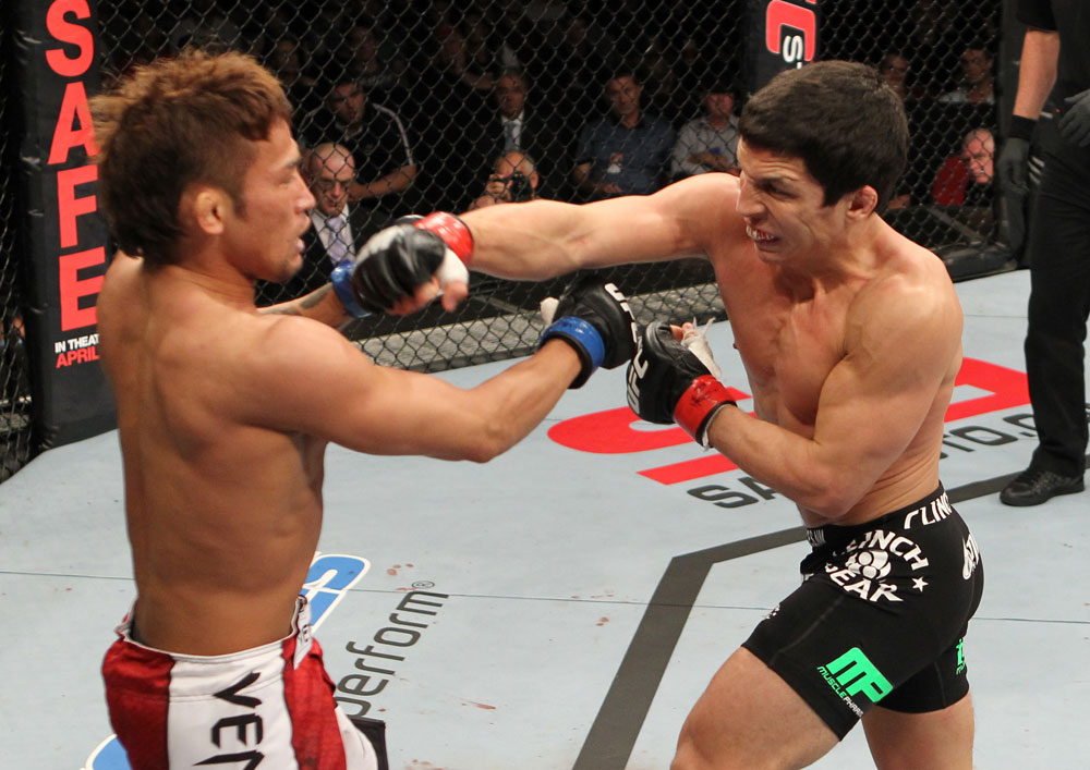 SYDNEY, AUSTRALIA - MARCH 03: (R-L) Joseph Benavidez punches Yasuhiro Urushitani in a flyweight bout during the UFC on FX event at Allphones Arena on March 3, 2012 in Sydney, Australia. (Photo by Josh Hedges/Zuffa LLC/Zuffa LLC via Getty Images) *** Local Caption *** Joseph Benavidez; Yasuhiro Urushitani