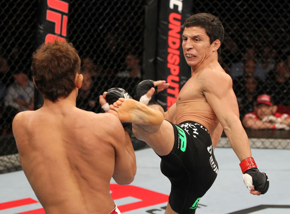 SYDNEY, AUSTRALIA - MARCH 03: (R-L) Joseph Benavidez kicks Yasuhiro Urushitani in a flyweight bout during the UFC on FX event at Allphones Arena on March 3, 2012 in Sydney, Australia. (Photo by Josh Hedges/Zuffa LLC/Zuffa LLC via Getty Images) *** Local Caption *** Joseph Benavidez; Yasuhiro Urushitani