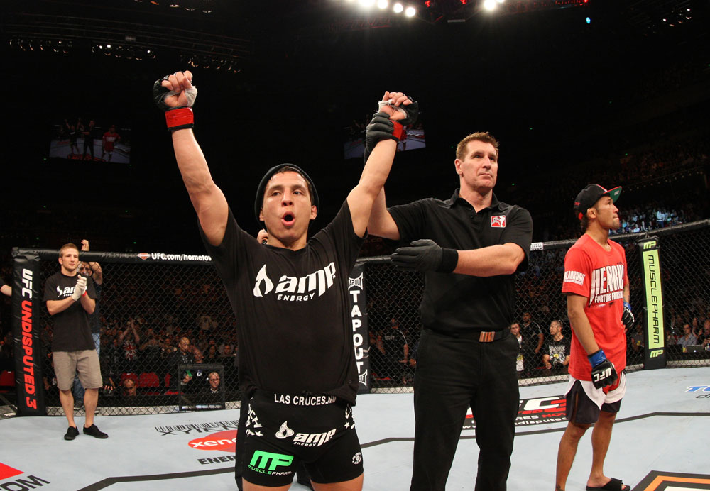 SYDNEY, AUSTRALIA - MARCH 03: Joseph Benavidez (L) reacts after knocking out Yasuhiro Urushitani (R) in a flyweight bout during the UFC on FX event at Allphones Arena on March 3, 2012 in Sydney, Australia. (Photo by Josh Hedges/Zuffa LLC/Zuffa LLC via Getty Images) *** Local Caption *** Joseph Benavidez; Yasuhiro Urushitani