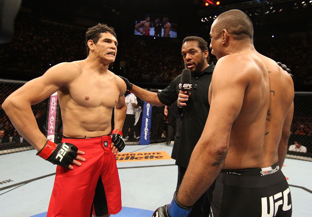 BELO HORIZONTE, BRAZIL - JUNE 23: (L-R) Cezar "Mutante" Ferreira and Sergio "Serginho" Moraes receive final instructions from the referee before their UFC 147 middleweight bout at Estadio Jornalista Felipe Drummond on June 23, 2012 in Belo Horizonte, Brazil. (Photo by Josh Hedges/Zuffa LLC/Zuffa LLC via Getty Images)