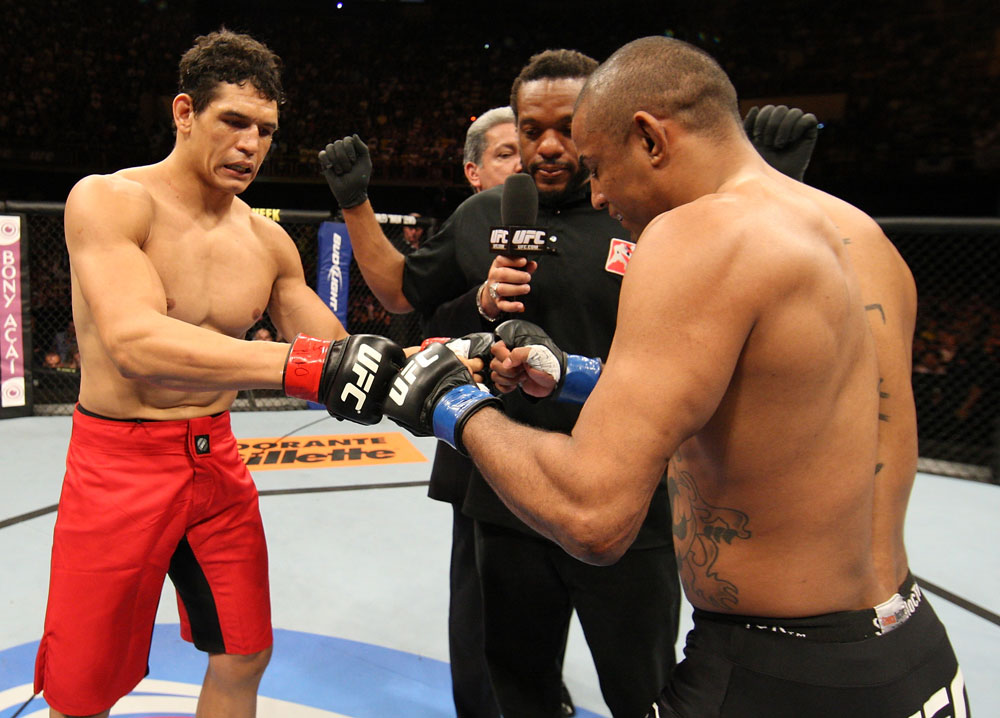 BELO HORIZONTE, BRAZIL - JUNE 23: (L-R) Cezar "Mutante" Ferreira and Sergio "Serginho" Moraes receive final instructions from the referee before their UFC 147 middleweight bout at Estádio Jornalista Felipe Drummond on June 23, 2012 in Belo Horizonte, Brazil. (Photo by Josh Hedges/Zuffa LLC/Zuffa LLC via Getty Images)
