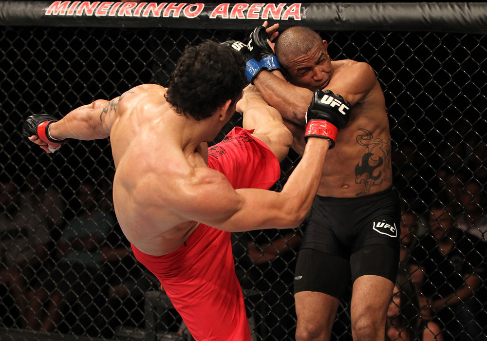 BELO HORIZONTE, BRAZIL - JUNE 23: (L-R) Cezar "Mutante" Ferreira kicks Sergio "Serginho" Moraes during their UFC 147 middleweight bout at Estádio Jornalista Felipe Drummond on June 23, 2012 in Belo Horizonte, Brazil. (Photo by Josh Hedges/Zuffa LLC/Zuffa LLC via Getty Images)