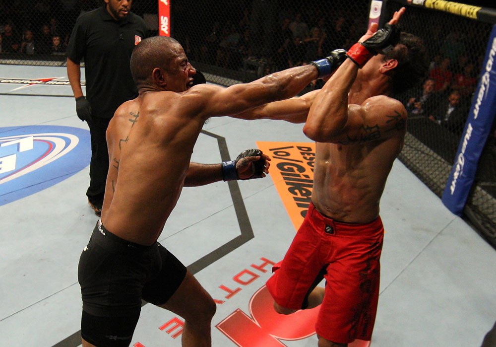 BELO HORIZONTE, BRAZIL - JUNE 23: (L-R) Sergio "Serginho" Moraes punches Cezar "Mutante" Ferreira during their UFC 147 middleweight bout at Estadio Jornalista Felipe Drummond on June 23, 2012 in Belo Horizonte, Brazil. (Photo by Josh Hedges/Zuffa LLC/Zuffa LLC via Getty Images)