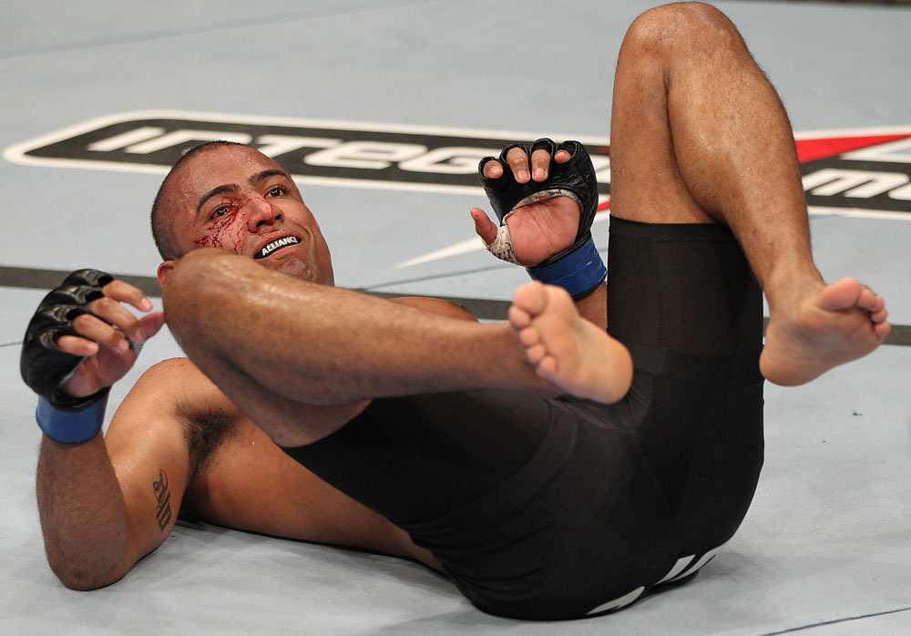 BELO HORIZONTE, BRAZIL - JUNE 23: Sergio "Serginho" Moraes lies on the canvas after being knocked down by Cezar "Mutante" Ferreira during their UFC 147 middleweight bout at Estadio Jornalista Felipe Drummond on June 23, 2012 in Belo Horizonte, Brazil. (Photo by Josh Hedges/Zuffa LLC/Zuffa LLC via Getty Images)