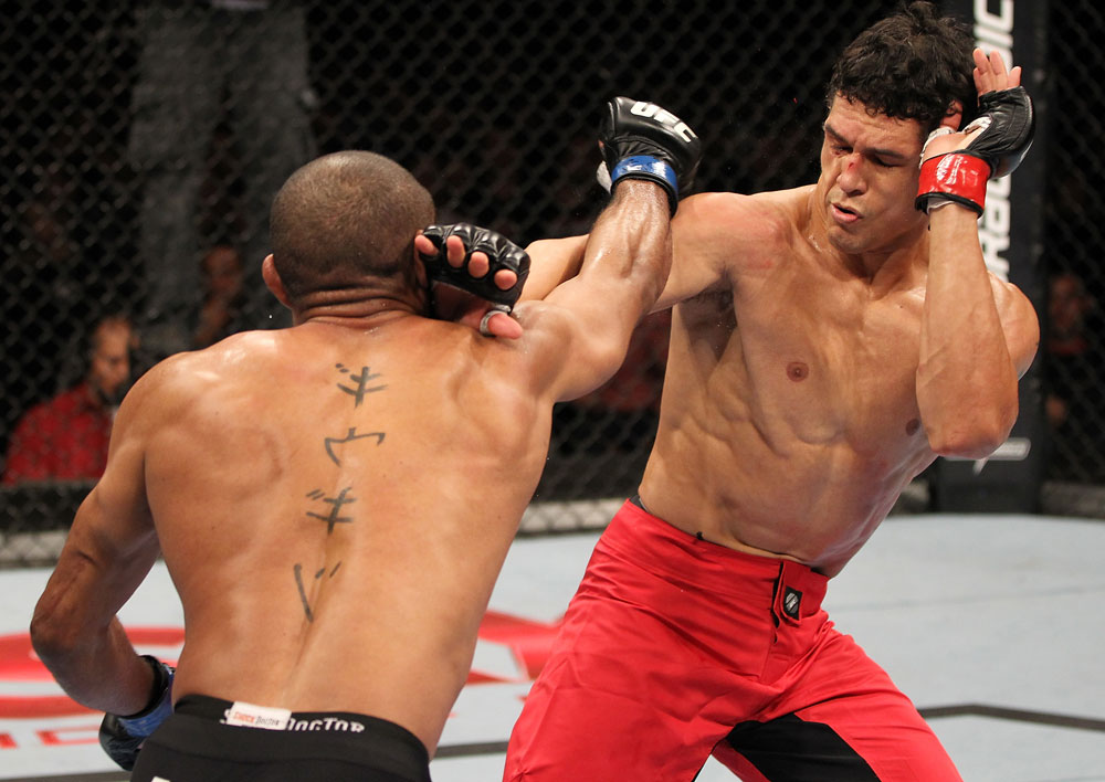 BELO HORIZONTE, BRAZIL - JUNE 23: (L-R) Sergio "Serginho" Moraes punches Cezar "Mutante" Ferreira during their UFC 147 middleweight bout at Estádio Jornalista Felipe Drummond on June 23, 2012 in Belo Horizonte, Brazil. (Photo by Josh Hedges/Zuffa LLC/Zuffa LLC via Getty Images)