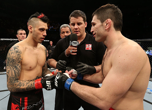NOTTINGHAM, ENGLAND - SEPTEMBER 29: Opponents Dan Hardy (L) and Amir Sadollah (R) receive final instructions from referee Mark Goddard before their welterweight fight at the UFC on Fuel TV event at Capital FM Arena on September 29, 2012 in Nottingham, England. (Photo by Josh Hedges/Zuffa LLC/Zuffa LLC via Getty Images)