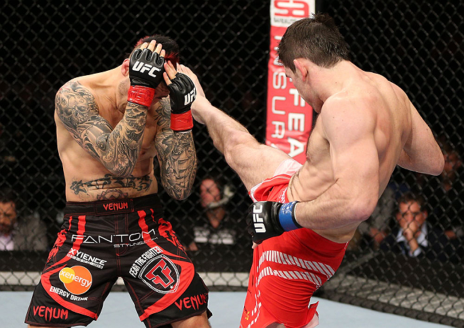 NOTTINGHAM, ENGLAND - SEPTEMBER 29: (R-L) Amir Sadollah kicks against Dan Hardy during their welterweight fight at the UFC on Fuel TV event at Capital FM Arena on September 29, 2012 in Nottingham, England. (Photo by Josh Hedges/Zuffa LLC/Zuffa LLC via Getty Images)