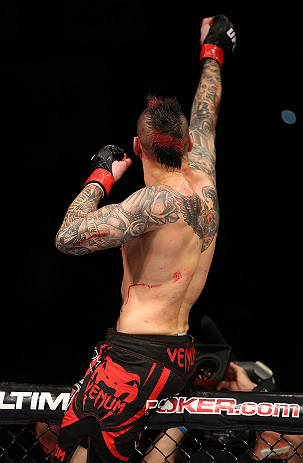 NOTTINGHAM, ENGLAND - SEPTEMBER 29: Dan Hardy reacts after defeating Amir Sadollah during their welterweight fight at the UFC on Fuel TV event at Capital FM Arena on September 29, 2012 in Nottingham, England. (Photo by Josh Hedges/Zuffa LLC/Zuffa LLC via Getty Images)