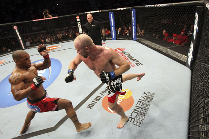 CALGARY, CANADA - JULY 21:  (L-R) Hector Lombard exchanges punches with Tim Boetsch during their middleweight bout at UFC 149 inside the Scotiabank Saddledome on July 21, 2012 in Calgary, Alberta, Canada.  (Photo by Nick Laham/Zuffa LLC/Zuffa LLC via Getty Images)