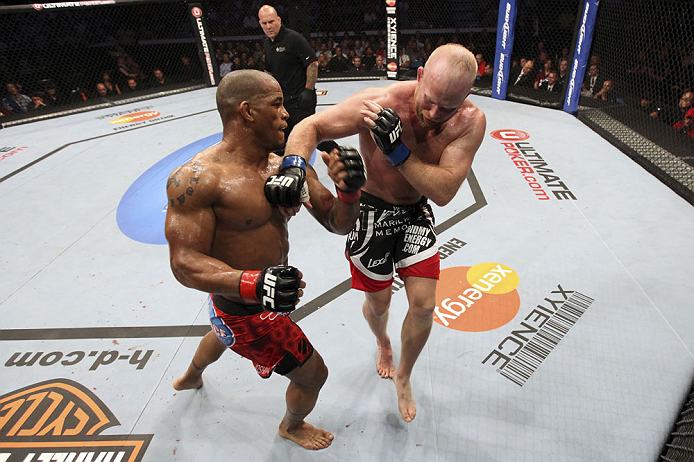 CALGARY, CANADA - JULY 21:  (L-R) Hector Lombard exchanges punches with Tim Boetsch during their middleweight bout at UFC 149 inside the Scotiabank Saddledome on July 21, 2012 in Calgary, Alberta, Canada.  (Photo by Nick Laham/Zuffa LLC/Zuffa LLC via Getty Images)