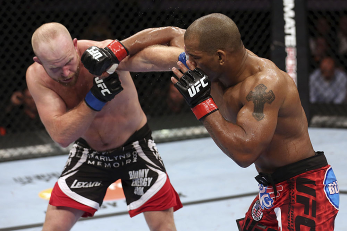 CALGARY, CANADA - JULY 21: (R-L) Hector Lombard throws a punch at Tim Boetsch during their middleweight bout at UFC 149 inside the Scotiabank Saddledome on July 21, 2012 in Calgary, Alberta, Canada.  (Photo by Nick Laham/Zuffa LLC/Zuffa LLC via Getty Images)