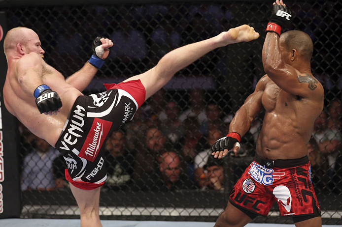 CALGARY, CANADA - JULY 21: (L-R) Tim Boetsch attempts to kick Hector Lombard during their middleweight bout at UFC 149 inside the Scotiabank Saddledome on July 21, 2012 in Calgary, Alberta, Canada.  (Photo by Nick Laham/Zuffa LLC/Zuffa LLC via Getty Images)