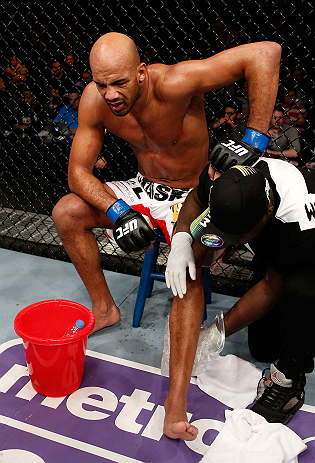 LONDON, ENGLAND - FEBRUARY 16: Cyrille Diabate sits on his stool in pain after suffering an injury against Jimi Manuwa in their light heavyweight fight during the UFC on Fuel TV event on February 16, 2013 at Wembley Arena in London, England. (Photo by Josh Hedges/Zuffa LLC/Zuffa LLC via Getty Images)