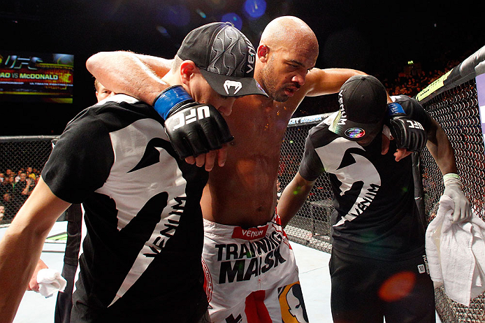 LONDON, ENGLAND - FEBRUARY 16: Cyrille Diabate is carried from the Octagon after suffering an injury against Jimi Manuwa in their light heavyweight fight during the UFC on Fuel TV event on February 16, 2013 at Wembley Arena in London, England. (Photo by Josh Hedges/Zuffa LLC/Zuffa LLC via Getty Images)
